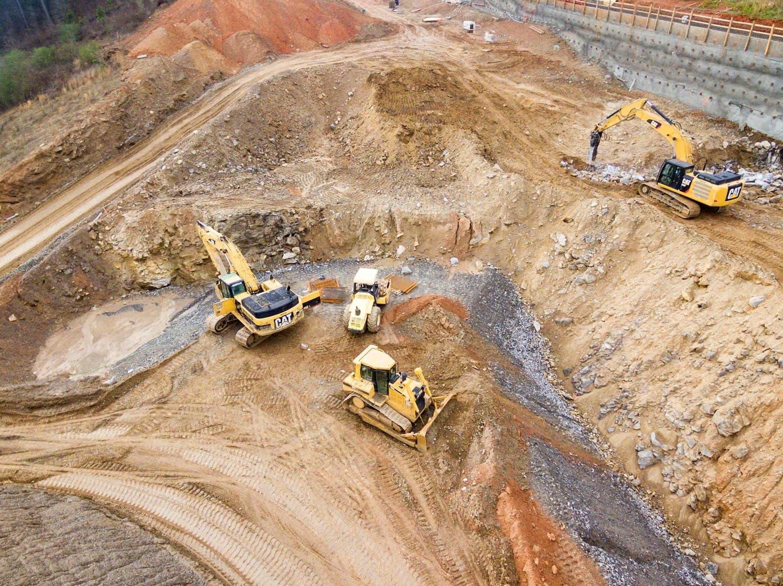 Aerial view of excavators working an earthworks site