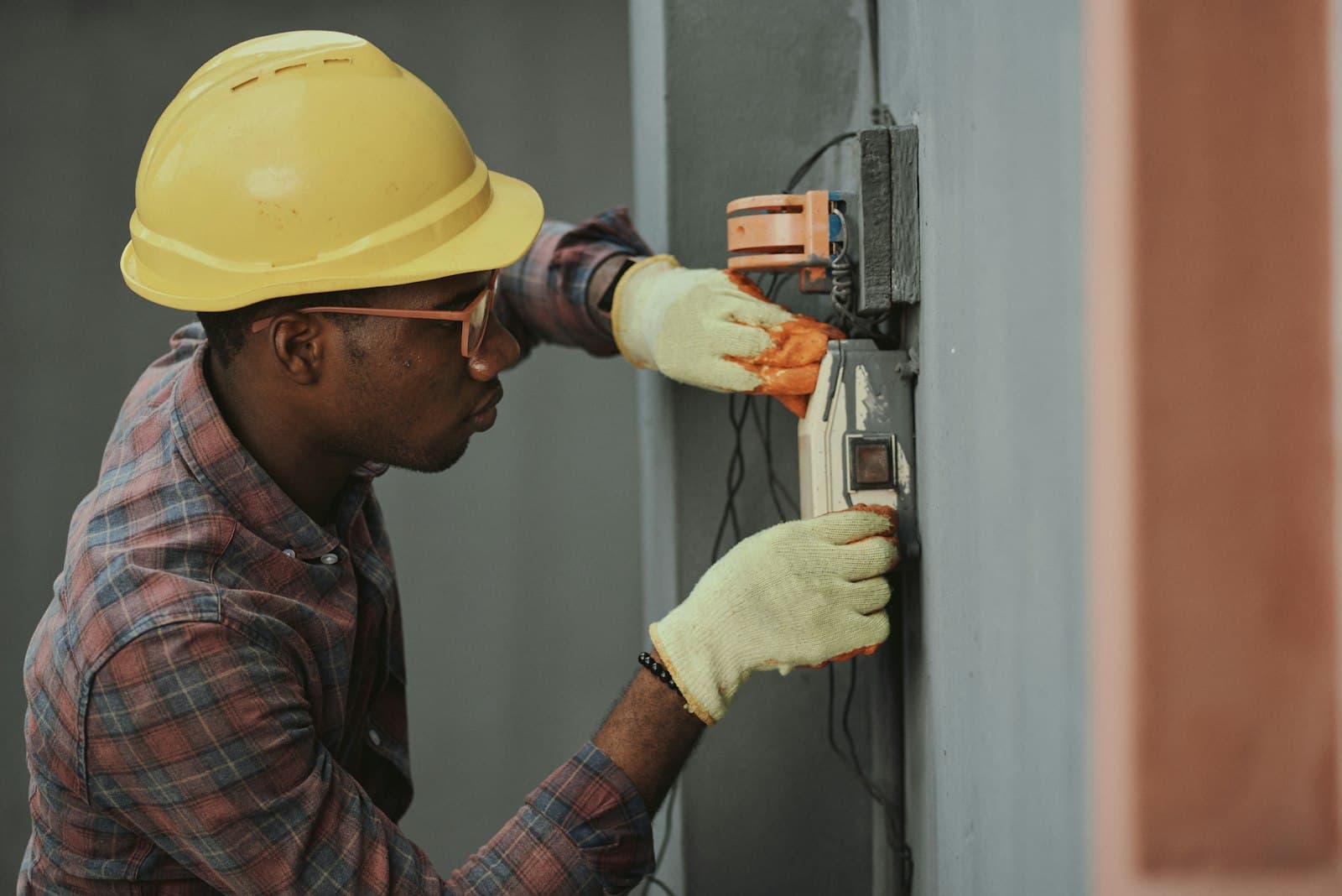 A technician completing an installation on site